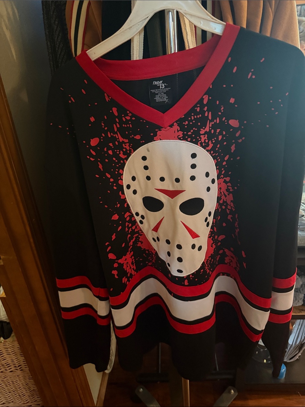 Black & Red Hockey Jersey with White Friday the 13th Mask Graphic